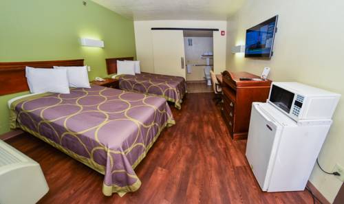 Imagen de la habitación del Hotel Masters Inn Tucker. Foto 13