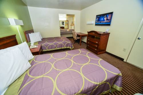 Imagen de la habitación del Hotel Masters Inn Tucker. Foto 16
