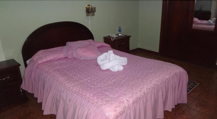 Imagen de la habitación del Hotel Master's Suite. Foto 7