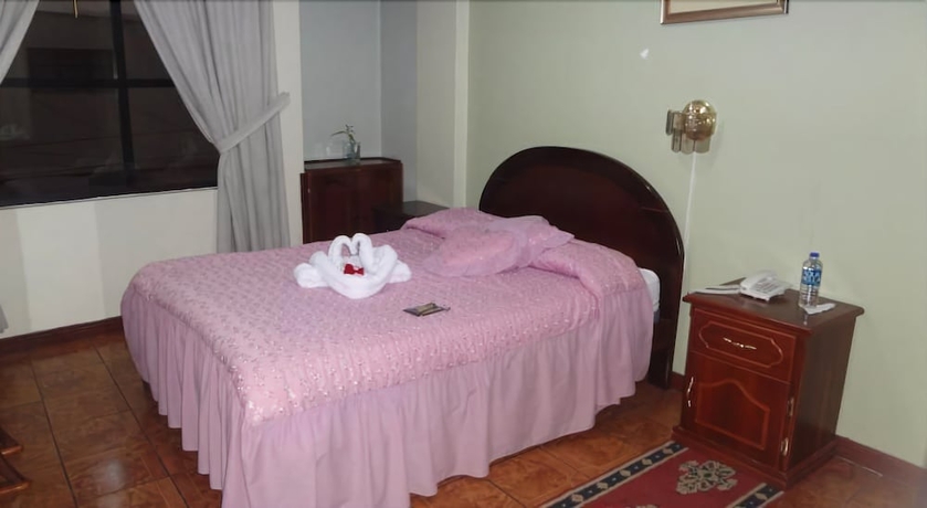 Imagen de la habitación del Hotel Master's Suite. Foto 8