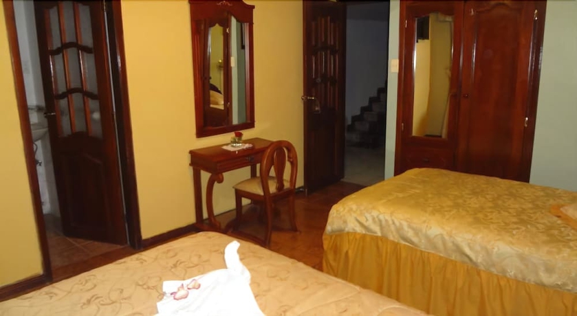 Imagen de la habitación del Hotel Master's Suite. Foto 10