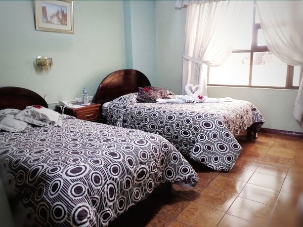 Imagen de la habitación del Hotel Master's Suite. Foto 14