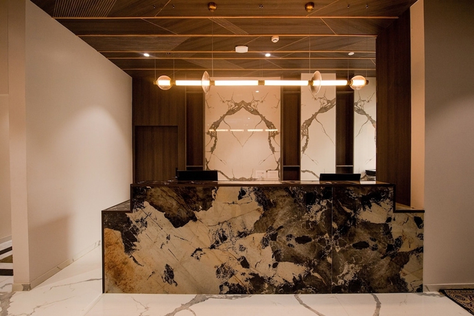 Imagen de los interiores del Hotel Mastiff Hotel Ankleshwar. Foto 15