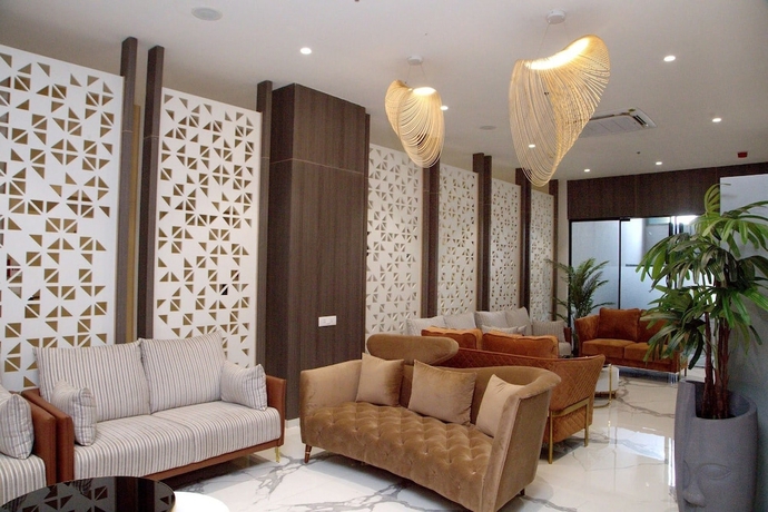 Imagen de los interiores del Hotel Mastiff Hotel Ankleshwar. Foto 17