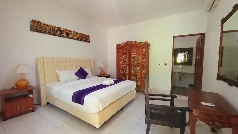 Imagen de la habitación del Hotel Matahari Inn Kuta Lombok. Foto 21