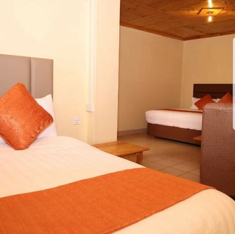 Imagen de la habitación del Hotel Mataman Gardens. Foto 15