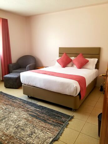 Imagen de la habitación del Hotel Mataman Gardens. Foto 17