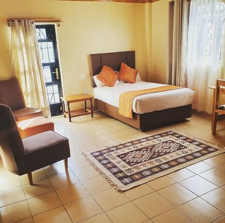 Imagen de la habitación del Hotel Mataman Gardens. Foto 20