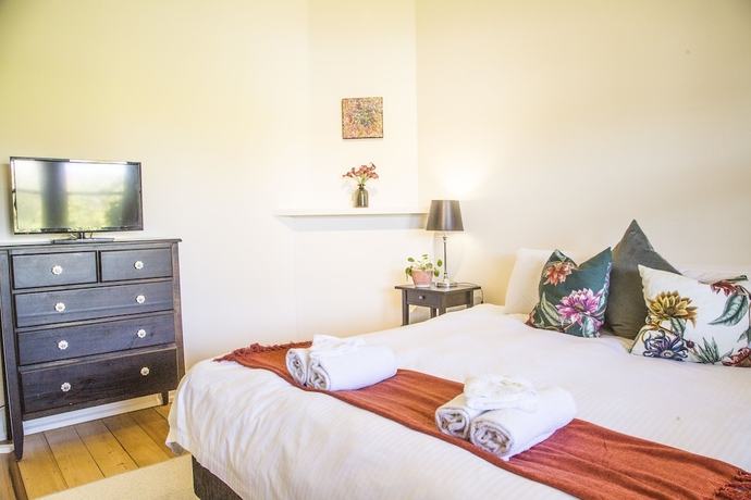 Imagen de la habitación del Hotel Mataro Cottage. Foto 6