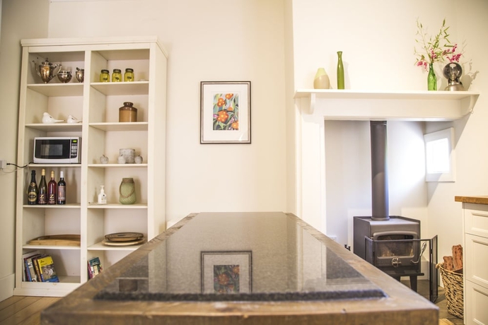 Imagen de la habitación del Hotel Mataro Cottage. Foto 15