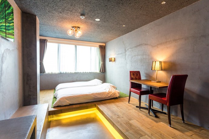 Imagen de la habitación del Hotel Material. Foto 6