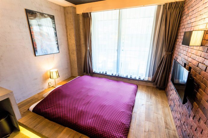 Imagen de la habitación del Hotel Material. Foto 12