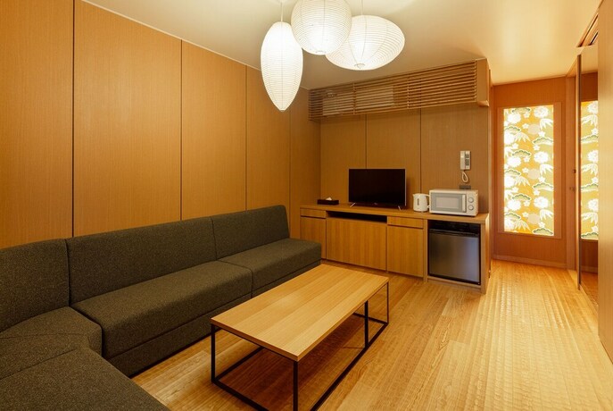 Imagen de la habitación del Hotel Material Fuchomae. Foto 17