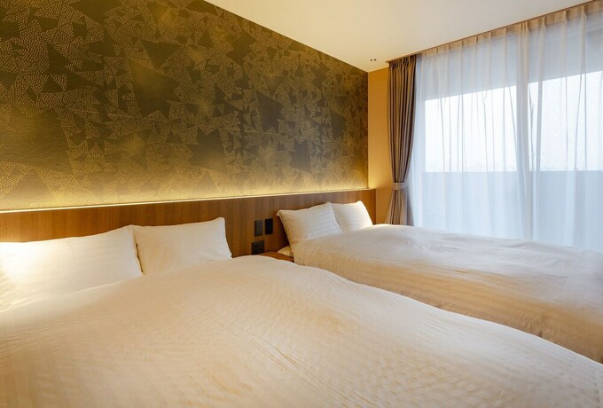 Imagen de la habitación del Hotel Material Fuchomae. Foto 33