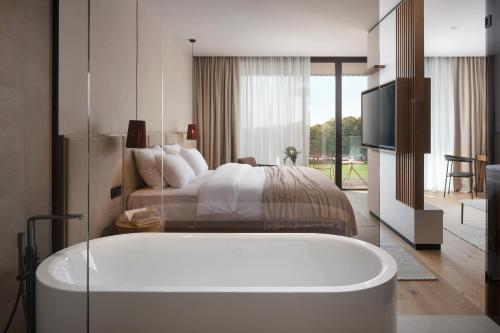 Imagen de la habitación del Hotel Materra. Foto 16