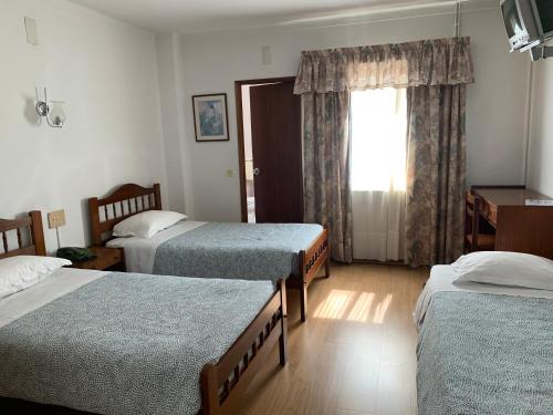 Imagen de la habitación del Hotel Mateus. Foto 18