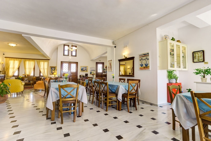 Imagen del bar/restaurante del Hotel Mathios Village. Foto 2