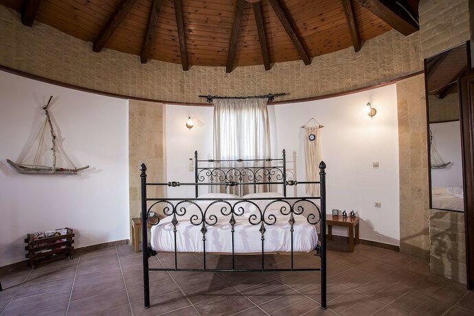 Imagen de la habitación del Hotel Mathraki Resort. Foto 11