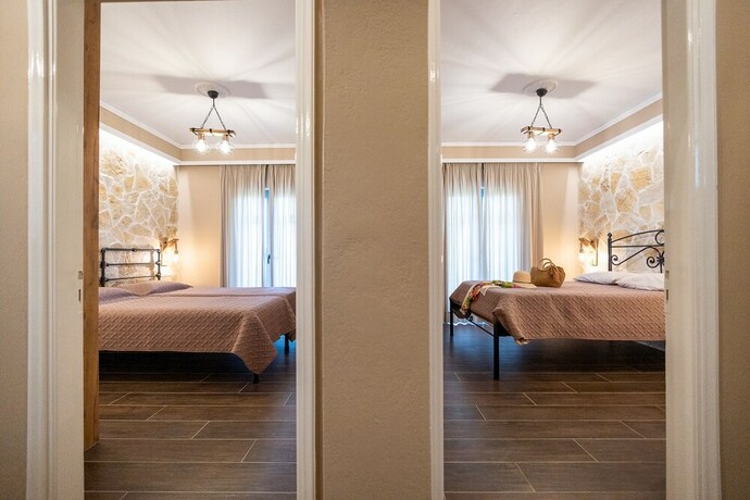 Imagen de la habitación del Hotel Mathraki Resort. Foto 19