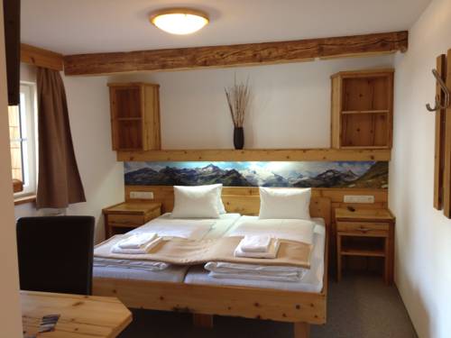Imagen de la habitación del Hotel Matreier Tauernhaus. Foto 11