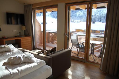 Imagen de la habitación del Hotel Mats Lech Alpenquartier. Foto 10
