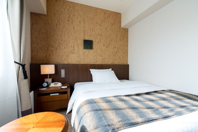 Imagen de la habitación del Hotel Matsumoto Marunouchi. Foto 11