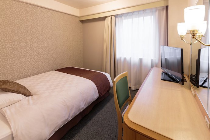 Imagen de la habitación del Hotel Matsuyama Tokyu REI Hotel. Foto 11