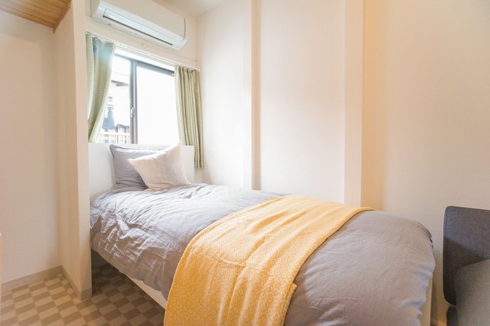 Imagen de la habitación del Hotel Matsuyamachi House. Foto 17