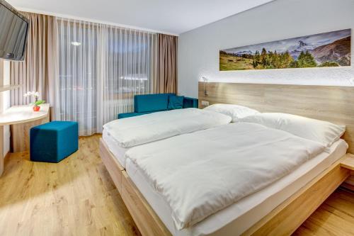 Imagen de la habitación del Hotel Matterhorn Inn, Tasch. Foto 8