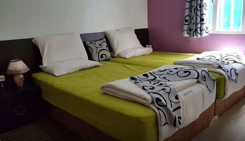 Imagen de la habitación del Hotel Mattina Motel. Foto 15