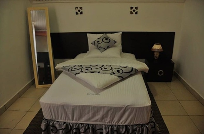 Imagen de la habitación del Hotel Mattina Motel. Foto 18