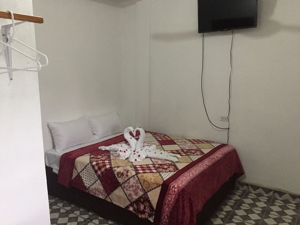 Imagen de la habitación del Hotel Matus Guest House. Foto 15