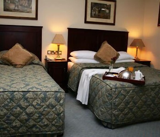 Imagen de la habitación del Hotel Maudlins House. Foto 6
