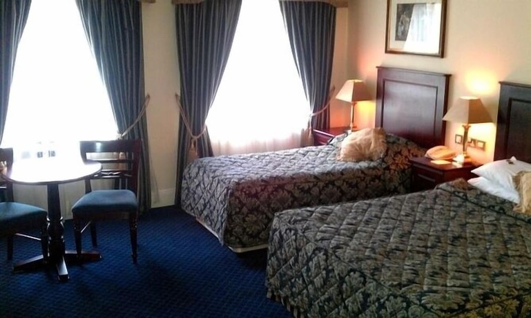 Imagen de la habitación del Hotel Maudlins House. Foto 9