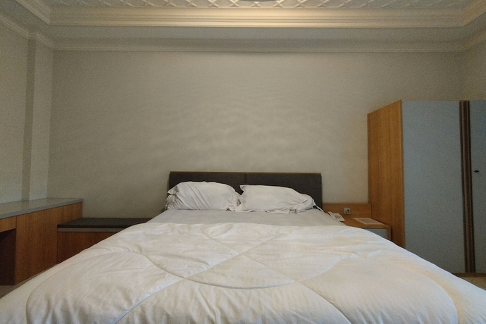 Imagen de la habitación del Hotel Maulidia and Convention Center. Foto 4