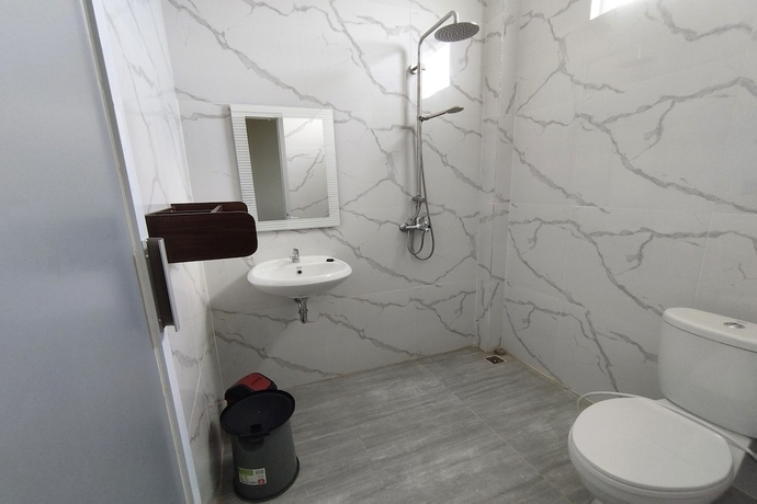 Imagen de la habitación del Hotel Maulidia and Convention Center. Foto 9