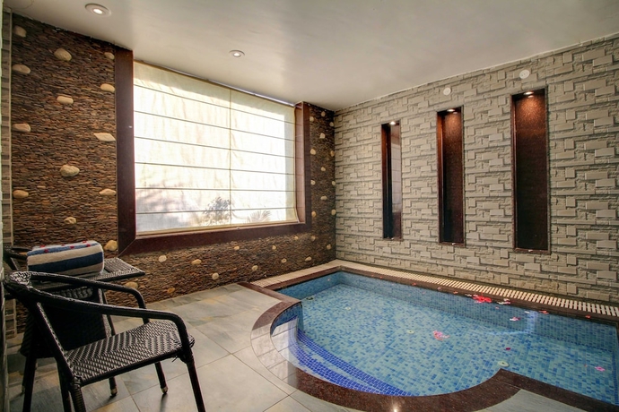 Imagen de la habitación del Hotel Maulik Mansion Resort. Foto 5