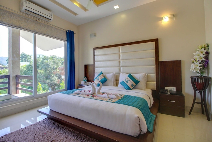 Imagen de la habitación del Hotel Maulik Mansion Resort. Foto 10