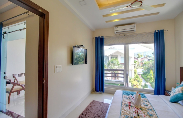 Imagen de la habitación del Hotel Maulik Mansion Resort. Foto 11