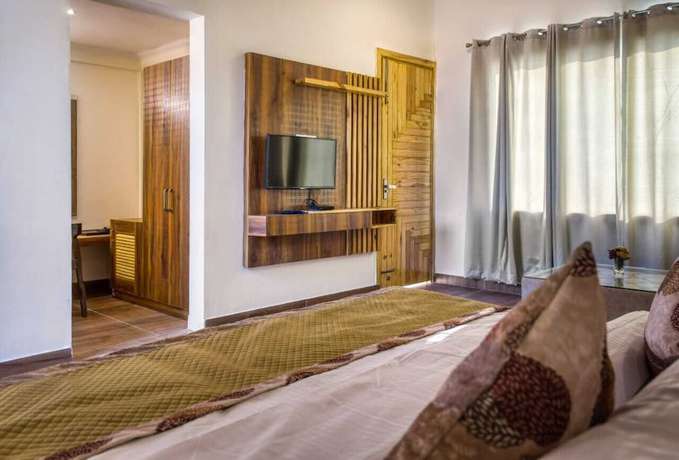 Imagen de la habitación del Hotel Maulik Retreat. Foto 9