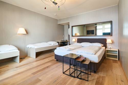 Imagen de la habitación del Hotel M&auml;rchenhotel Bellevue. Foto 10