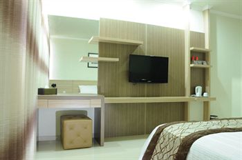 Imagen del bar/restaurante del Hotel Maumu And Lounge. Foto 3