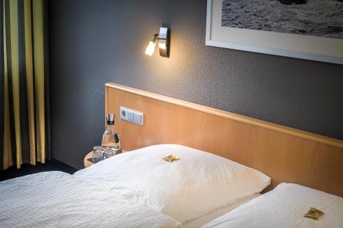 Imagen de la habitación del Hotel Mautner Airport und Messehotel Stuttgart. Foto 8