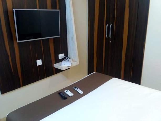 Imagen de la habitación del Hotel Maval Grand. Foto 18