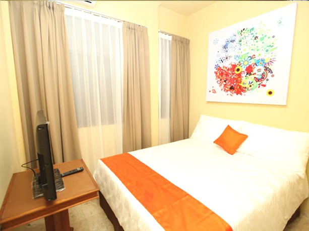 Imagen de la habitación del Hotel Maven Buncit. Foto 9