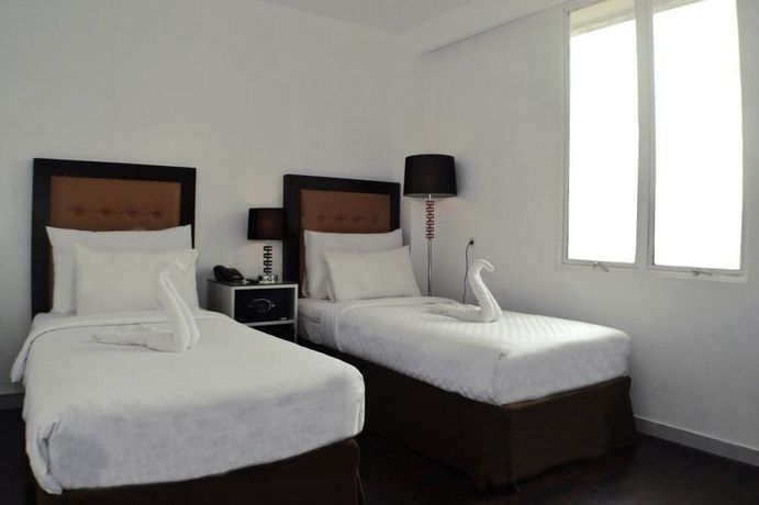 Imagen de la habitación del Hotel Maven Fatmawati. Foto 11