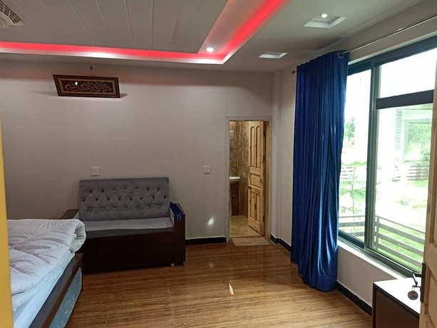 Imagen de la habitación del Hotel Mawa Balakot. Foto 15