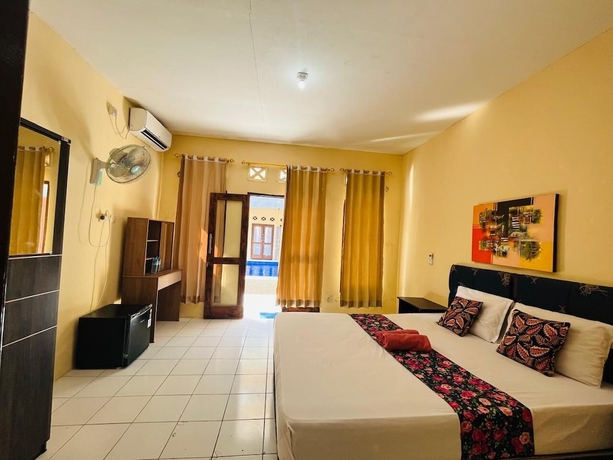 Imagen de la habitación del Hotel Mawar Bungalow. Foto 3
