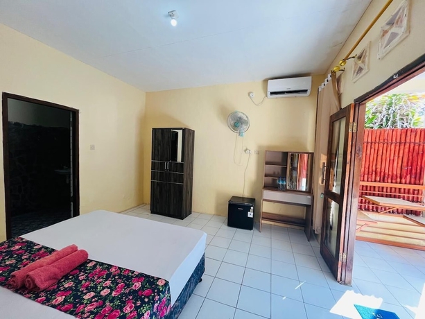 Imagen de la habitación del Hotel Mawar Bungalow. Foto 4