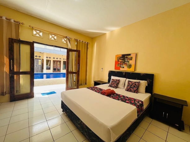 Imagen de la habitación del Hotel Mawar Bungalow. Foto 5